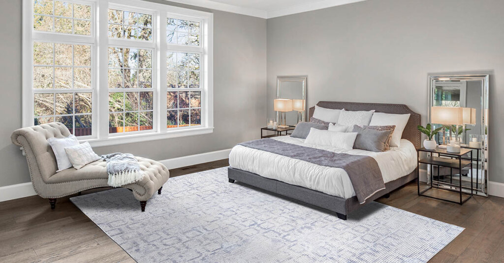 rugs placement at the foot of the bed